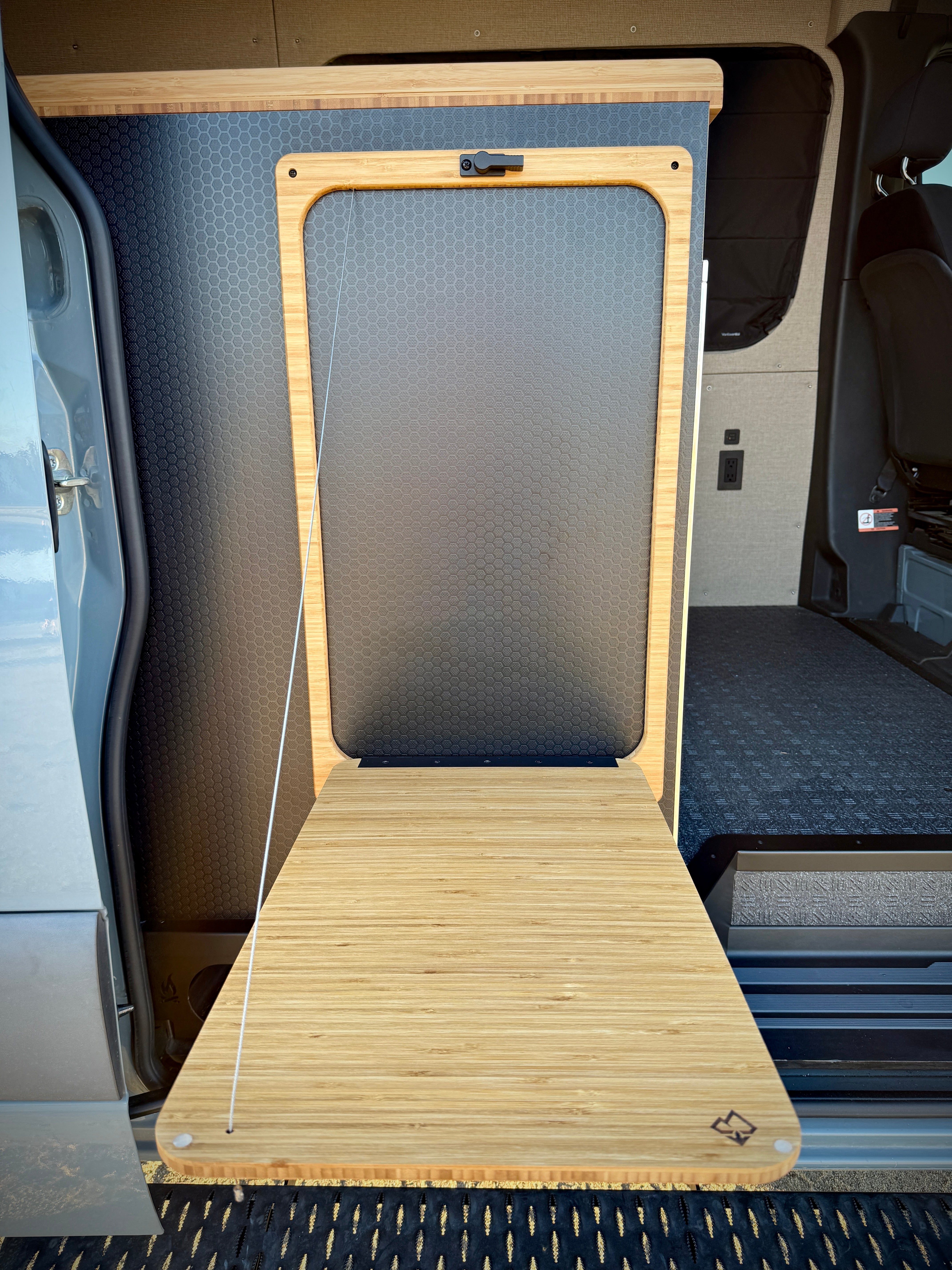 Bamboo folding table attached to a vehicle door