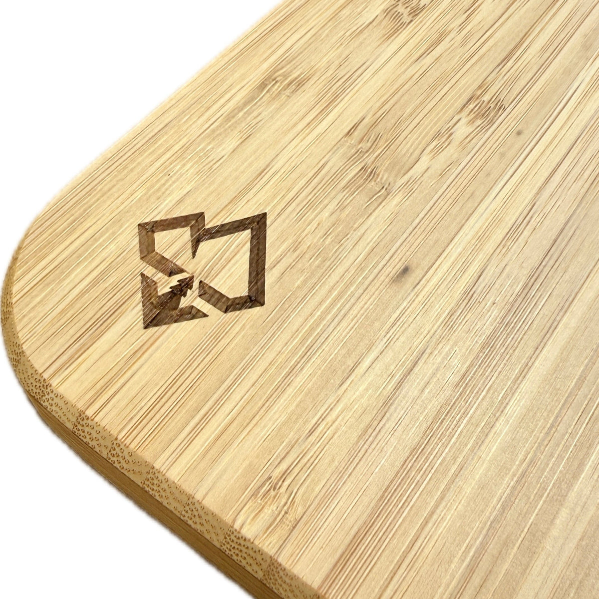 Bamboo Lagun table corner close-up with black logo and rounded contour