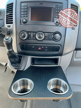 Load image into Gallery viewer, Mercedes-Benz Sprinter NCV3 06-18 Black Hex Cup Holder Snack Tray with XL Stainless Cup Holders. Converts factory sliding cup holders into a small table. Size: 12"x10.25". High pressure Black hex textured laminate top on 1/2" Baltic birch plywood base. Easy installation/removal, no vehicle modification required.