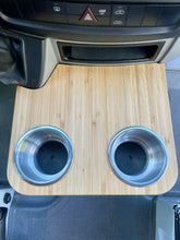 Load image into Gallery viewer, Sprinter NCV3 06-18 Cup Holder Snack Tray, XL Stainless Cup Holders, 12"x10.25". Bamboo Amber finish, 1/2" Solid Plyboo© Bamboo. Fits factory sliding cup holders, ideal for snacks and phone storage. Handcrafted in San Diego, CA. Free shipping in the lower 48 USA.