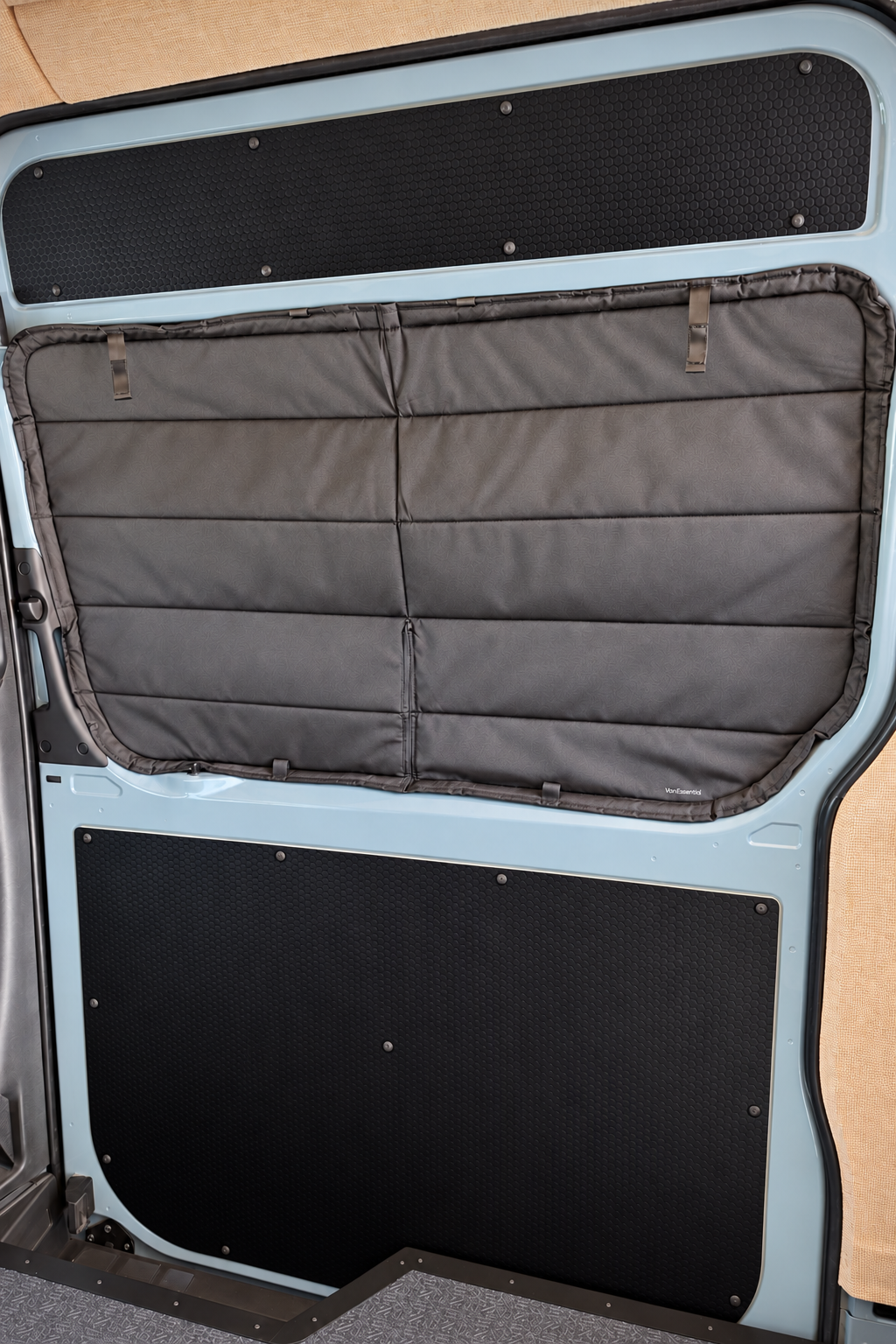 Black hex-pattern lower slider door panel with gray seat cover