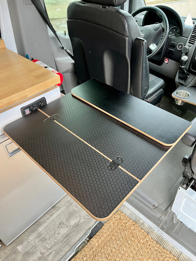 Camper van/RV Folding Black Hex Lagun Table, 1/2" thick, 21 1/2"x14" folded, 21 1/2"x28" extended. Ships with preinstalled hinges, no predrilled holes. Made in San Diego, CA, with free shipping in the lower 48 USA. Wood tabletop only, mount not included.