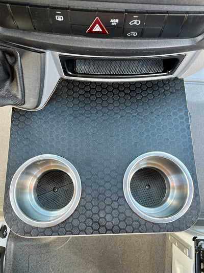 Sprinter NCV3 06-18 Black Hex Cup Holder Snack Tray, XL Stainless Cup Holders, 12"x10.25". Features textured Black hex laminate top, 1/2" Baltic birch plywood base. Ideal for snacks and phone storage. Handcrafted with Patent Pending design in San Diego, CA. Free shipping in the lower 48 USA.