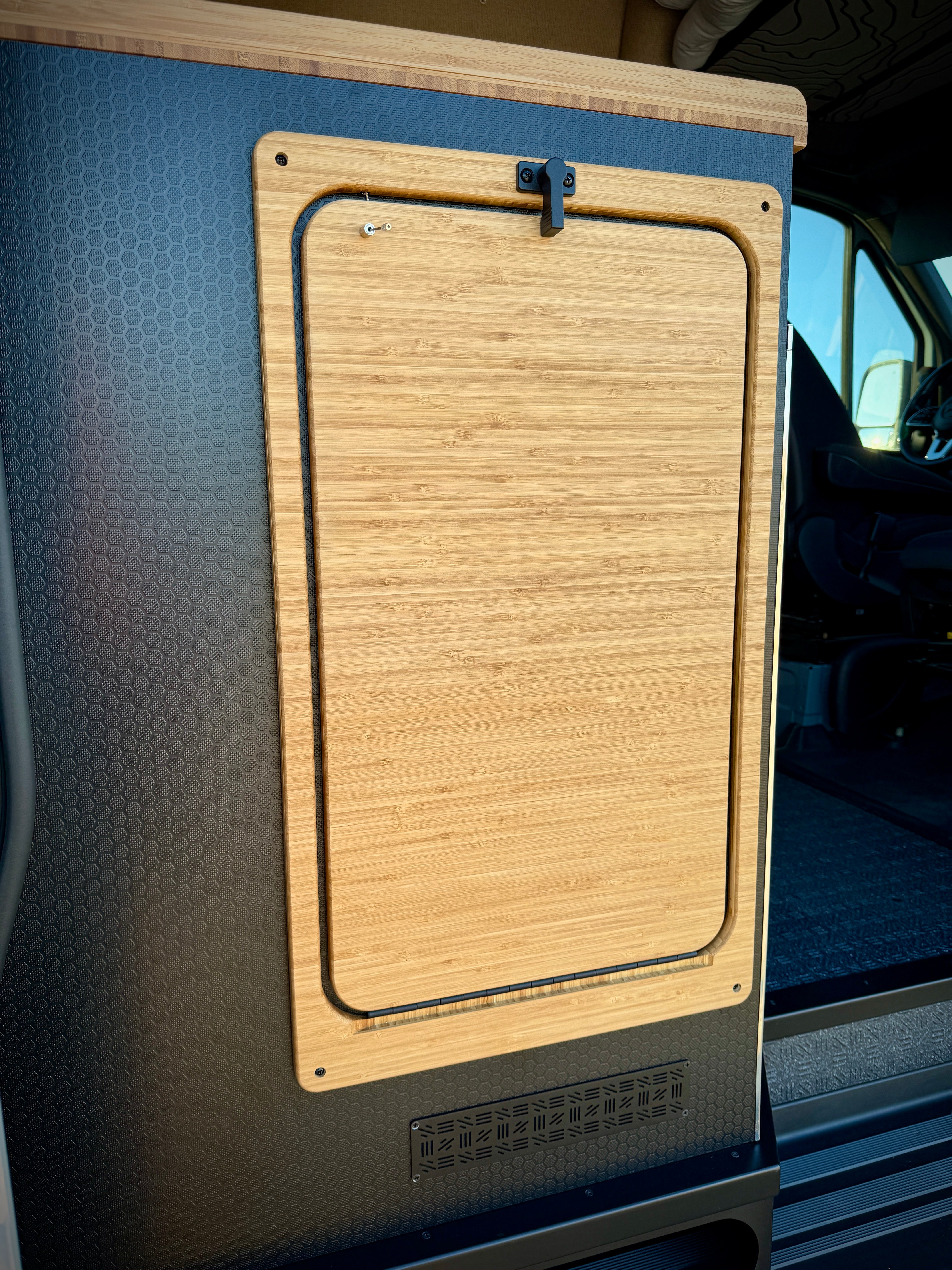 Bamboo folding table attached to a vehicle door