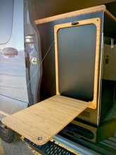 Load image into Gallery viewer, Bamboo folding table attached to a vehicle door
