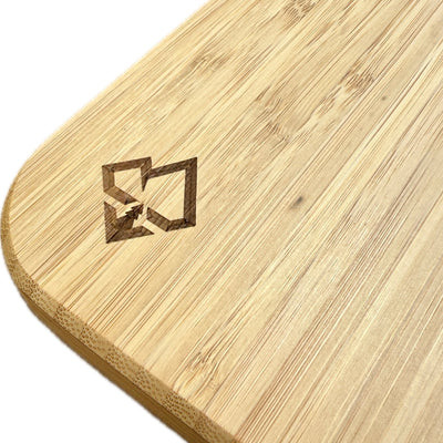 Bamboo Lagun table corner close-up with black logo and rounded contour