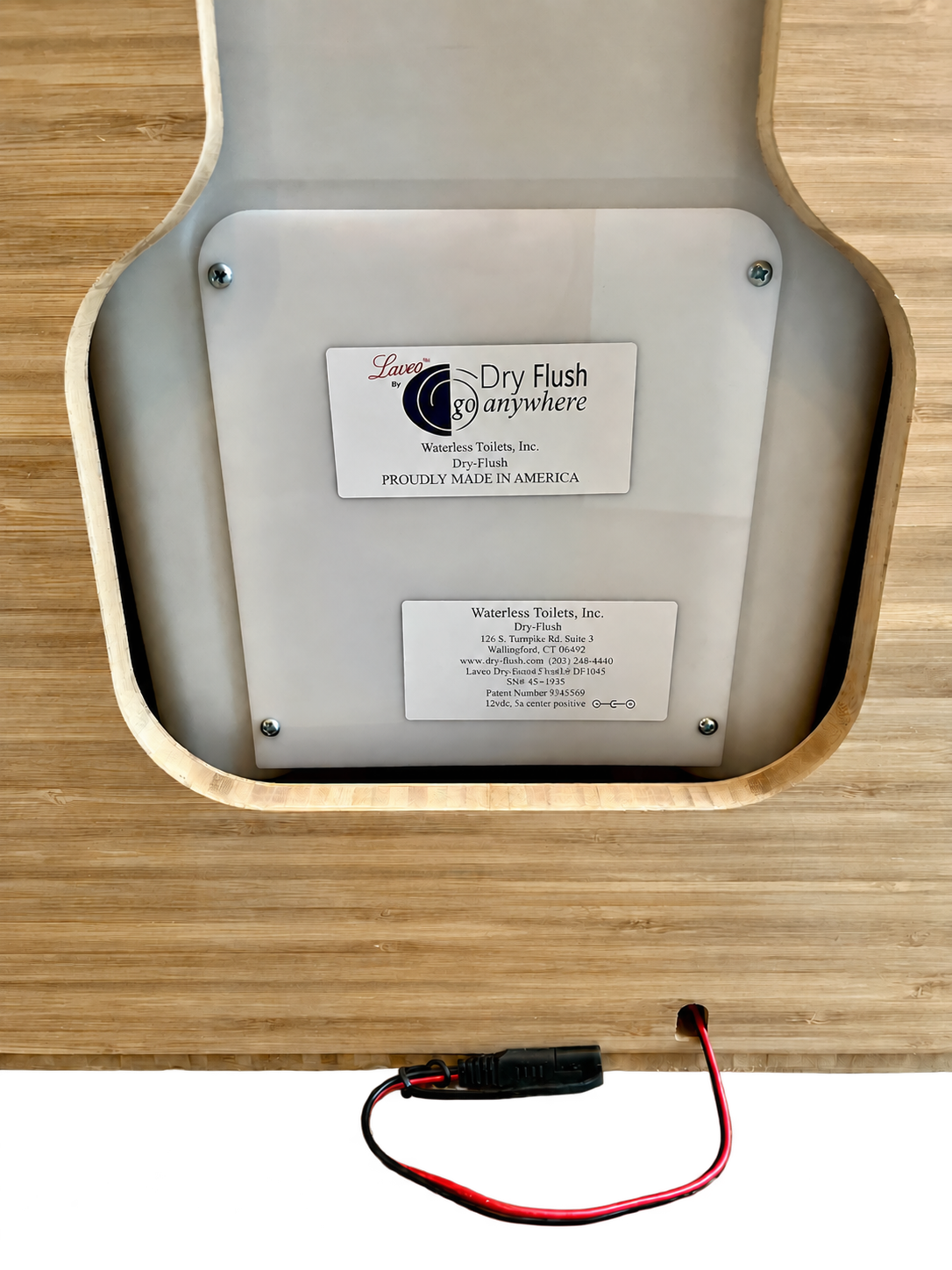 Bamboo cabinet base with mounted specification label and corner screws