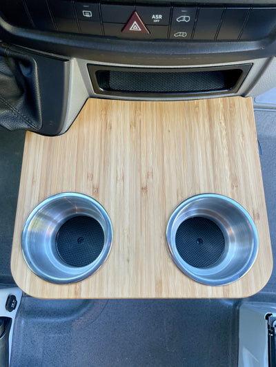 Sprinter NCV3 06-18 Cup Holder Snack Tray, XL Stainless Cup Holders, 12"x10.25". Bamboo Amber finish, 1/2" Solid Plyboo© Bamboo. Fits factory sliding cup holders, ideal for snacks and phone storage. Handcrafted in San Diego, CA. Free shipping in the lower 48 USA.